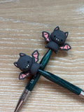 Bat needle stoppers for knitting needles