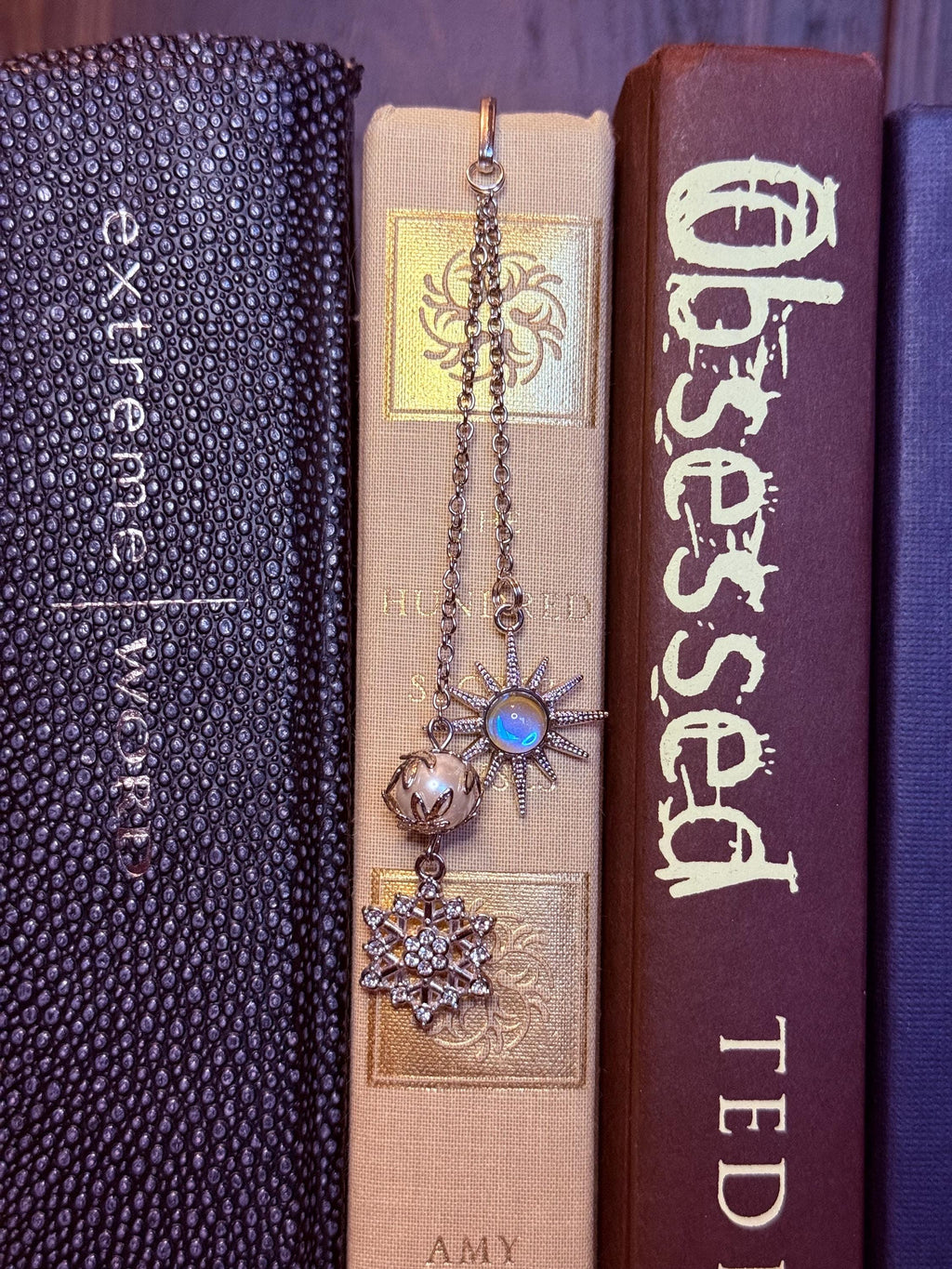 Sun and snowflake handmade metal bookmark
