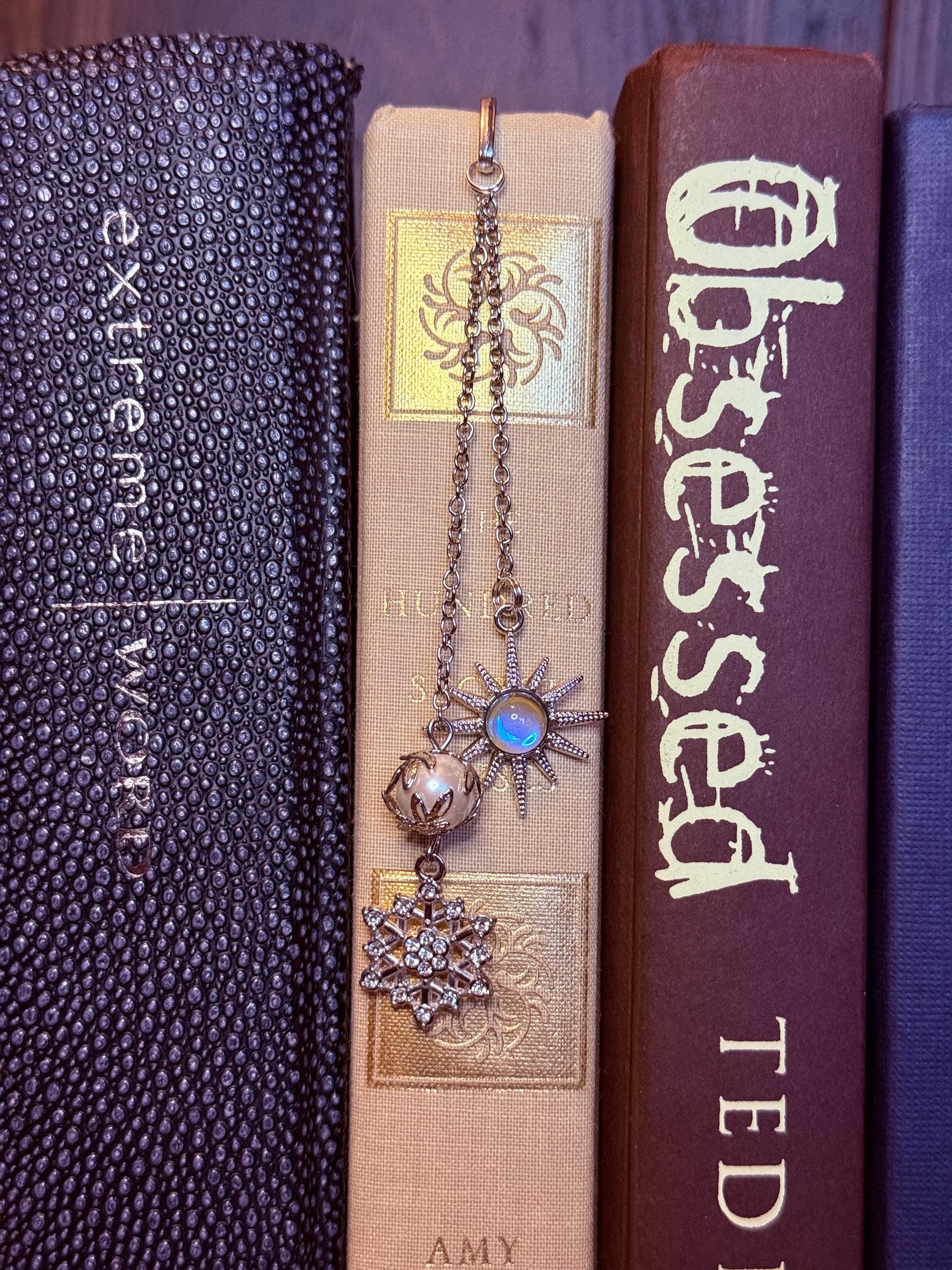 Sun and snowflake handmade metal bookmark