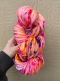 Solar flare Hand dyed super bulky merino wool, size 6 pink yellow purple , speckled, multicolor, indie dye, superwash spring colorway