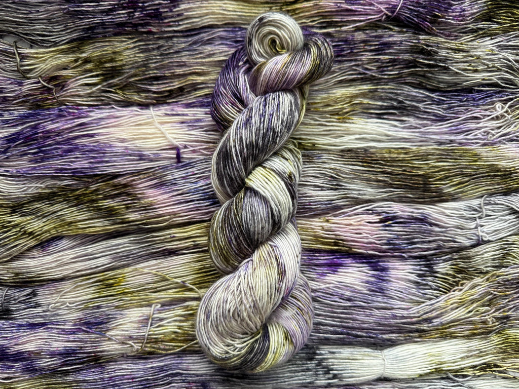 Pansy garden hand dyed (sock/fingering) merino wool, superwash yarn, green purple black, hank of yarn , for knit crochet