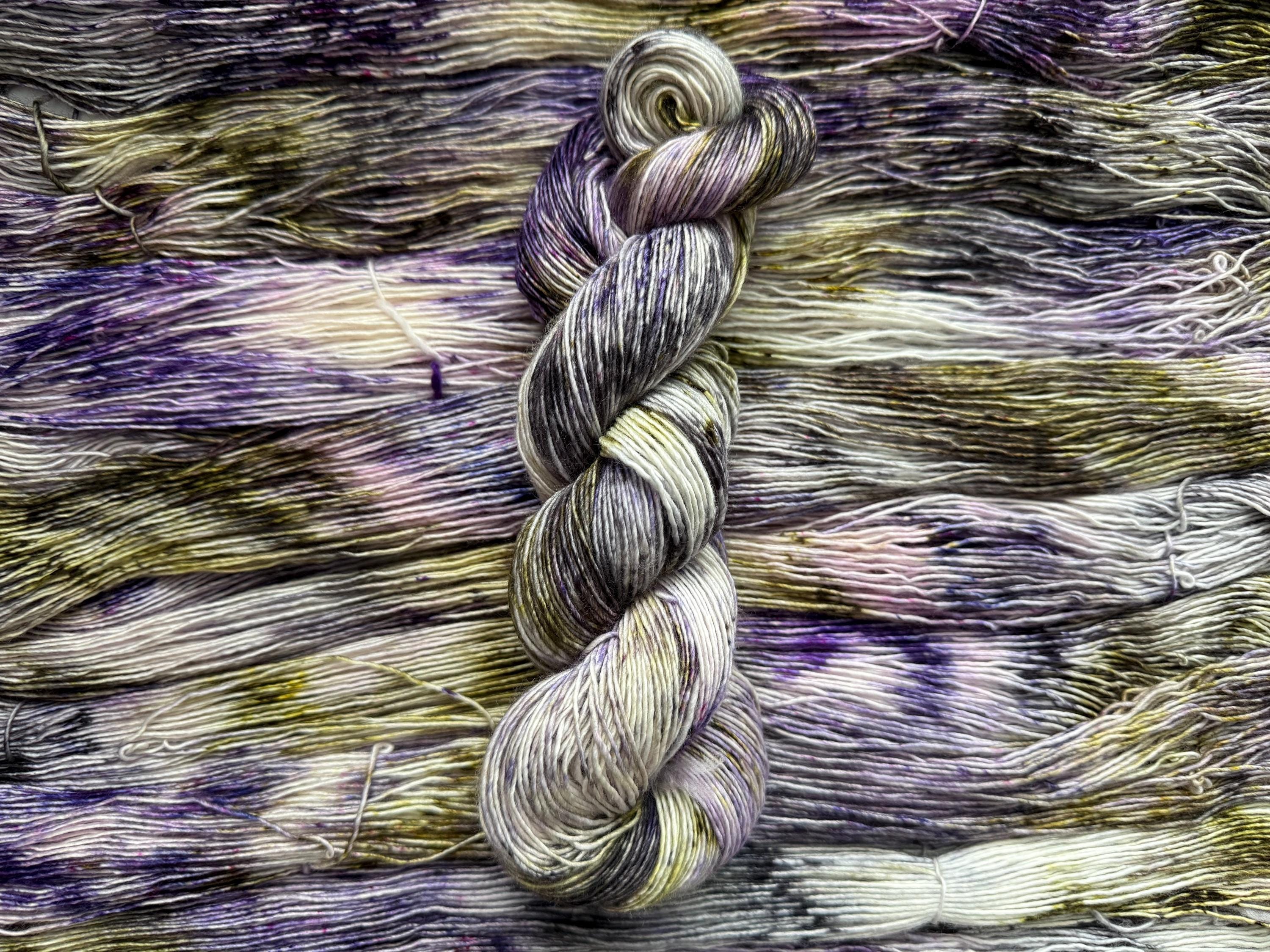 Pansy garden hand dyed (sock/fingering) merino wool, superwash yarn, green purple black, hank of yarn , for knit crochet