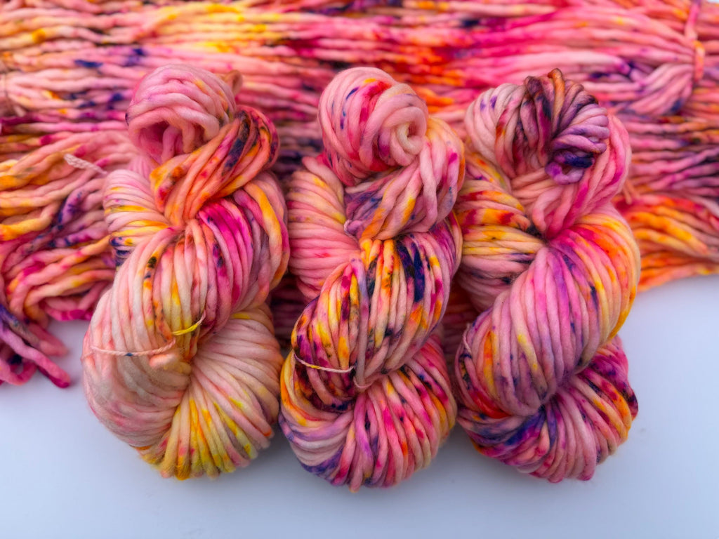 Solar flare Hand dyed super bulky merino wool, size 6 pink yellow purple , speckled, multicolor, indie dye, superwash spring colorway