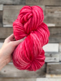 Draginfruit hand dyed super bulky merino wool, size 6, 98 yards, natural, semi solid, indie dye, superwash red pink