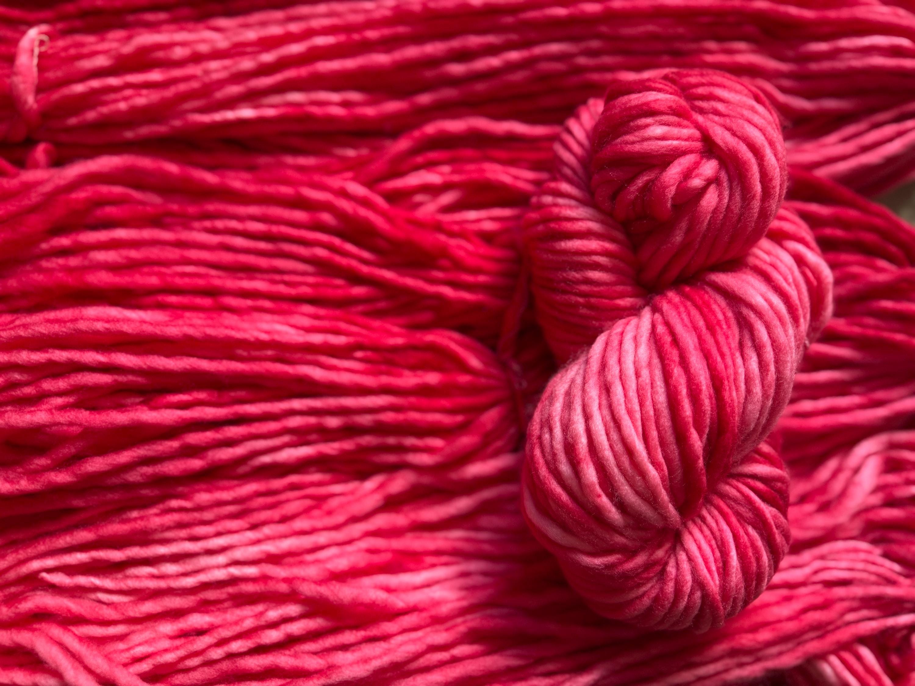 Draginfruit hand dyed super bulky merino wool, size 6, 98 yards, natural, semi solid, indie dye, superwash red pink
