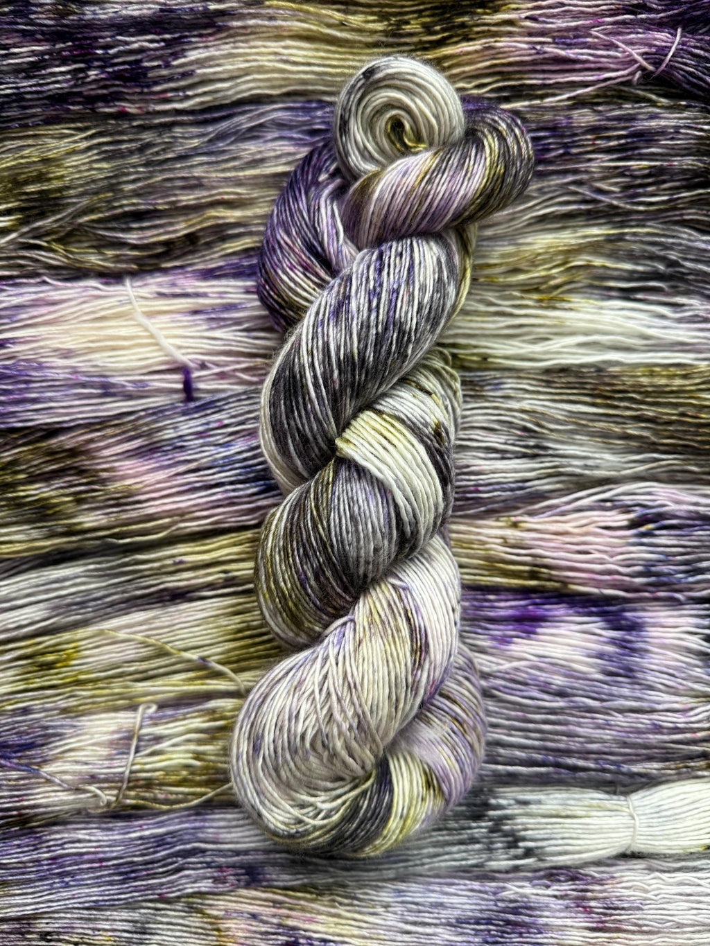 Pansy garden hand dyed (sock/fingering) merino wool, superwash yarn, green purple black, hank of yarn , for knit crochet