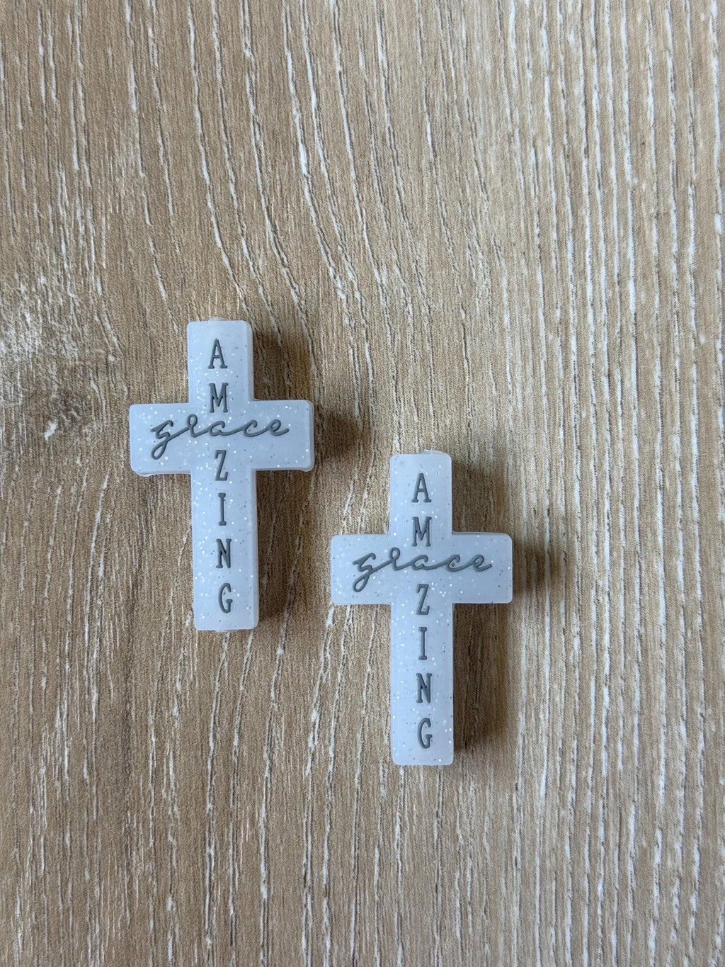 Cross needle stoppers, needle stopper for knitting needles