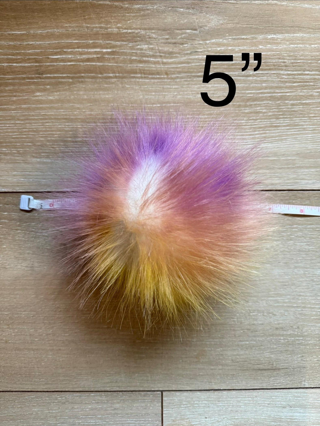 After glow faux fur Pom Pom