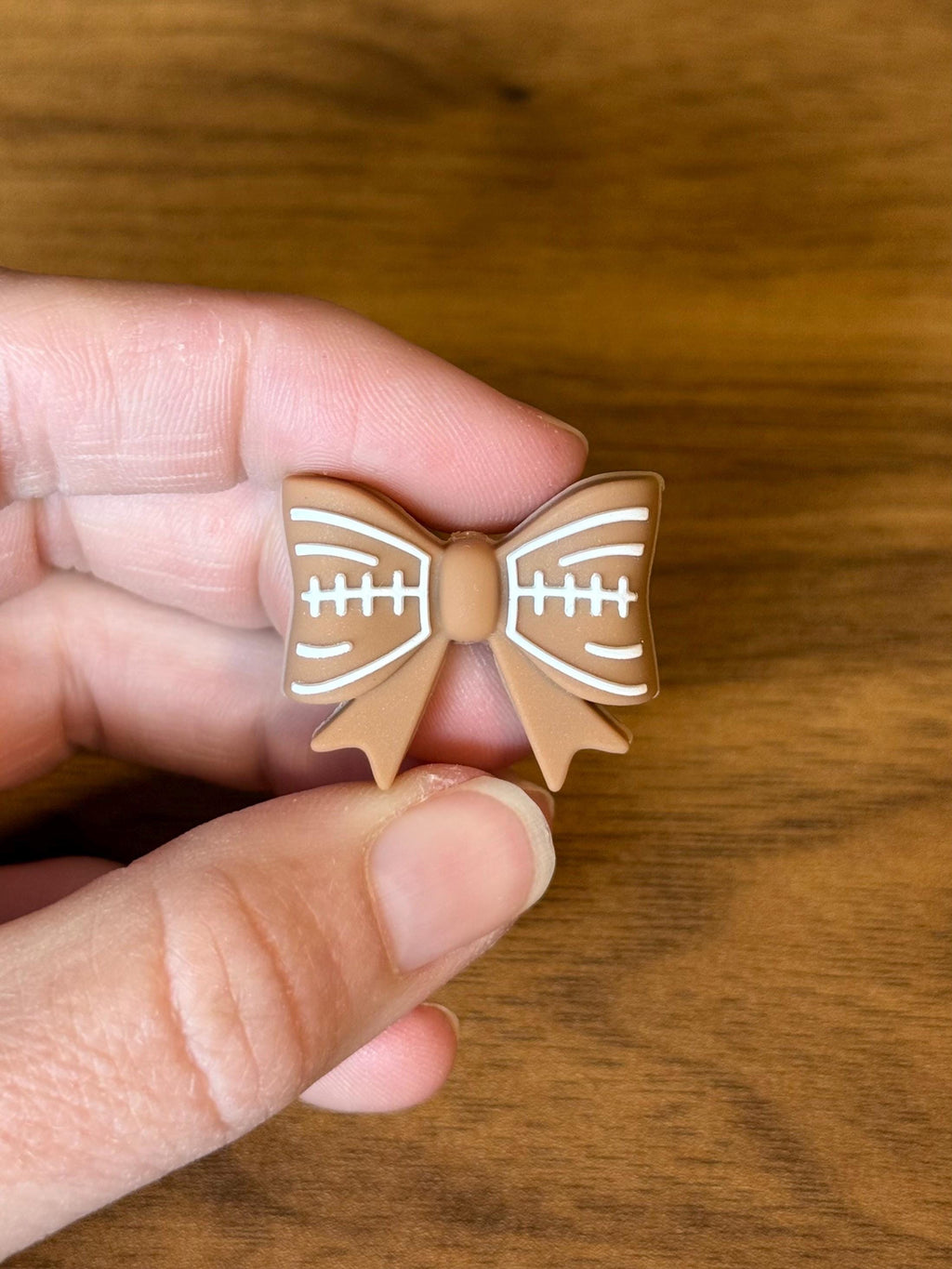 Needle stoppers for knitting needles, football bow, stitch stopper